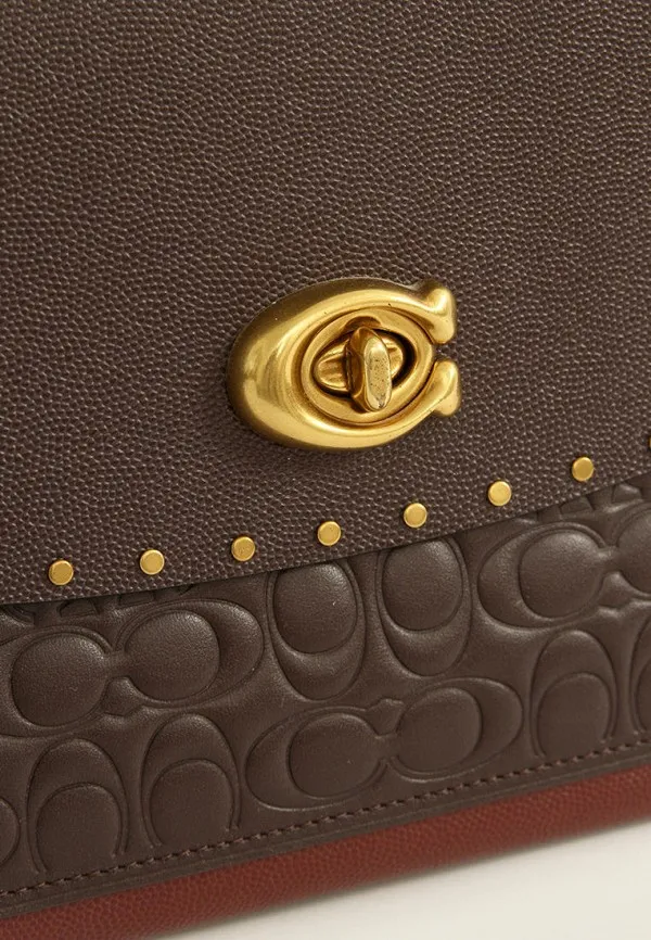 BOLSO FEMENINO COACH PARKER IN SIGNATURE